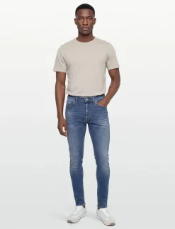 EVOLVE EVERLASTING - Tapered jeans